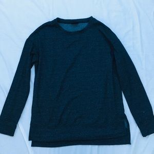 Dark grey sweater.